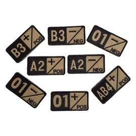 BLOOD GROUP badge A2+ embroidered on beige backing with black thread - hook and loop application - 7 x 3,5 cm