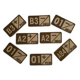 BLOOD GROUP badge AB+ embroidered on beige backing with brown thread - hook and loop application - 7 x 3,5 cm