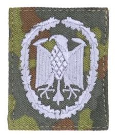 PATCH GENUINE GERMAN ACHIEVEMENT BADGE SILVER ON FLECKTARN CAMO FABRIC 55 x 45 MM